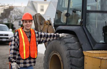Construction Worker and a Bulldozer