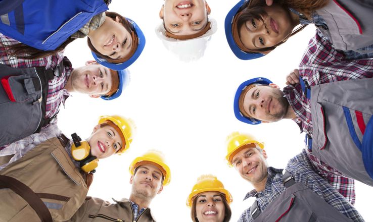 Group of young construction workers