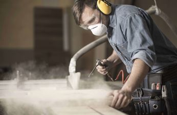 Carpenter working with a sander