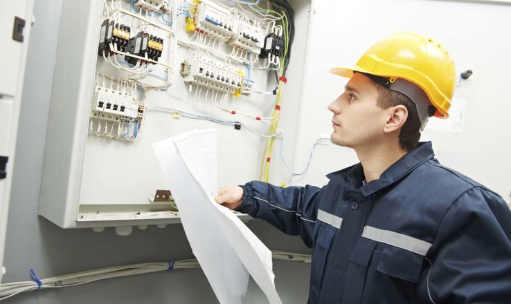 Electrician working on an electrical box