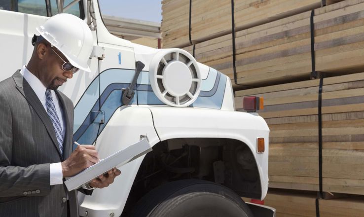 Engineer in front of a truck