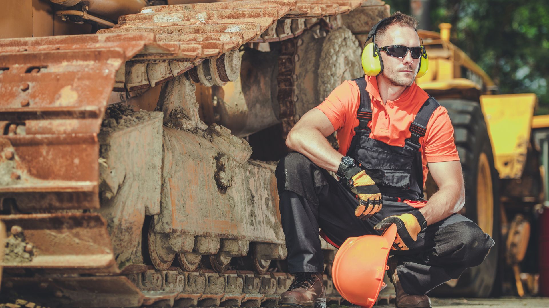 Man wearing construction hat in construction zone